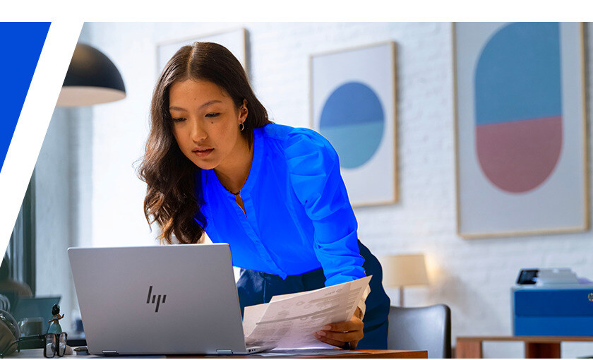 Business professional using an HP AI PC